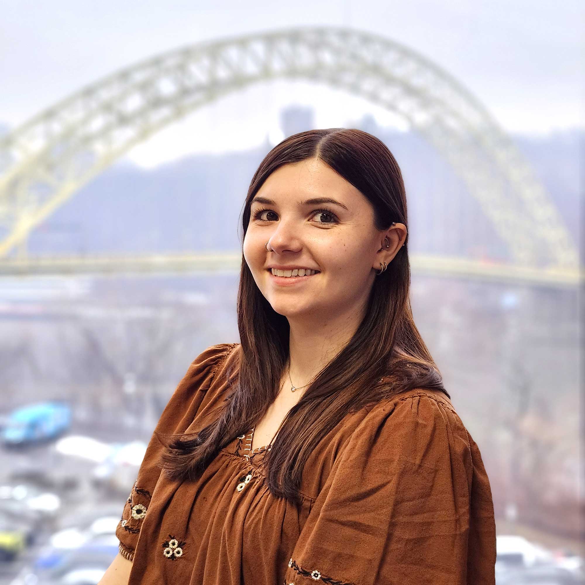 Smiling woman with brown hair
